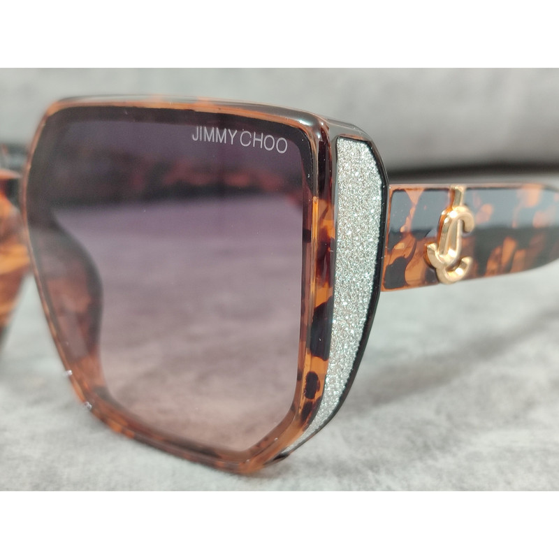 عینک آفتابی زنانه مدل مربع کائوچو شاین دار کد 27 UV400